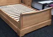 Oak sleigh bed with drawers