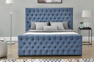 Blue fabric ottoman beds