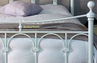 White metal beds