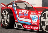 Close view of the childrens red racer car bed
