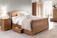 Solid oak sleigh bed with drawers