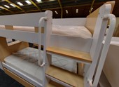 Wooden bunk beds with desk and guest bed trundle 